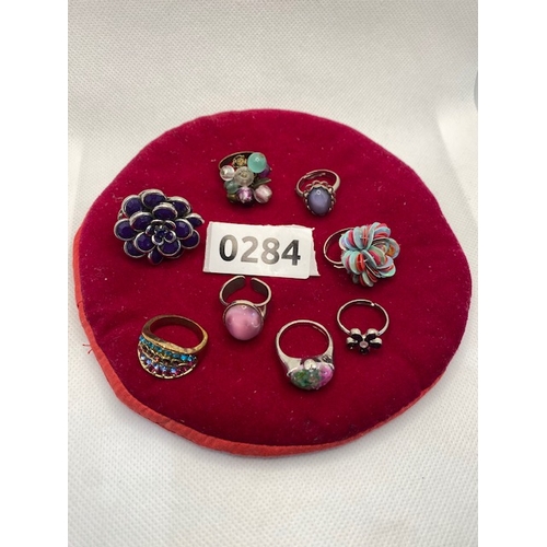 284 - costume jewellery rings selection, purples, pinks blues etc