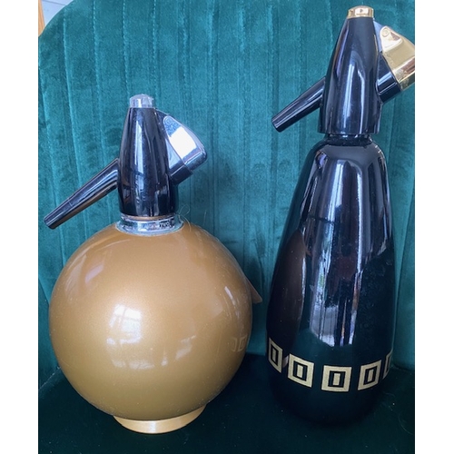 293 - vintage Stylish soda syphons (2)  round gold Globemaster model and black with gold pattern for bar o... 