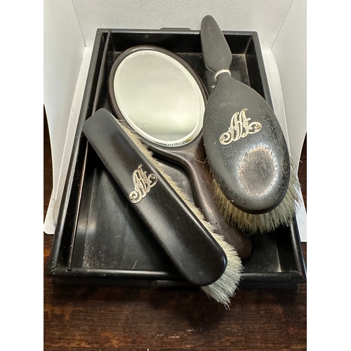 270 - Silver initials on ebony three piece c1900 grooming set on ebony tray