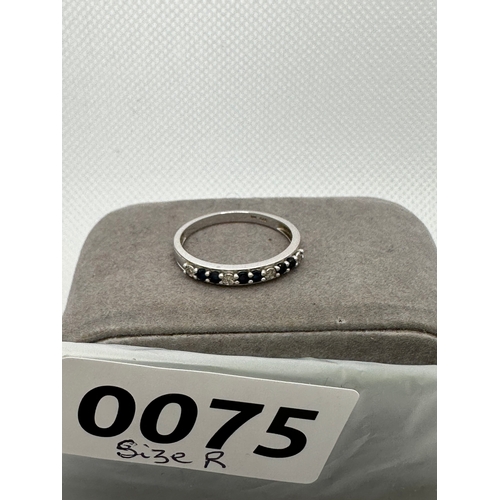 75 - White gold diamond and sapphire ring marked 