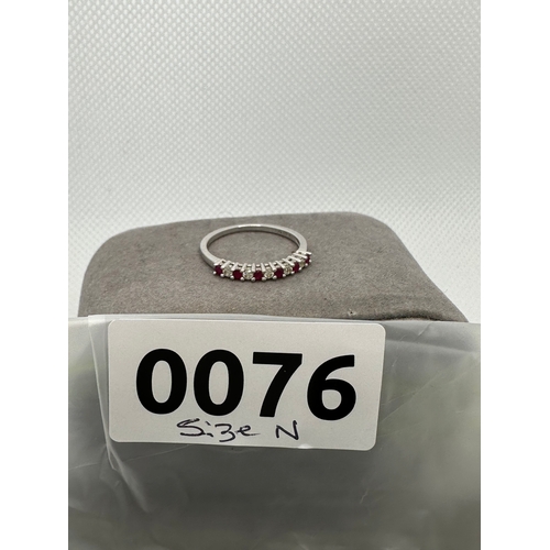 76 - 14K White Gold ring with rubies, marked 