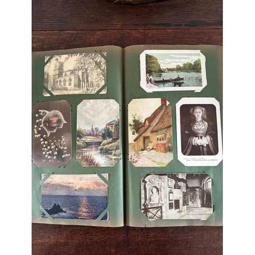 93 - collection of approx. 344 Edwardian, antique and early 20th century GB postcards in a very old dark ... 