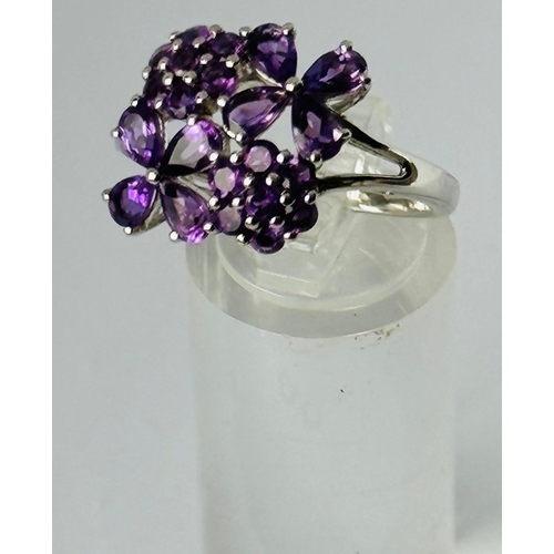 216 - 925 Silver Amethyst ring in pretty floral setting, size T