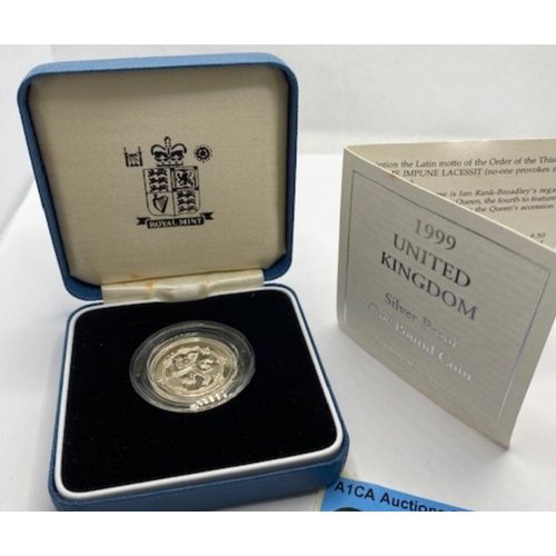 392 - Silver proof £1 coin with COA, 1999