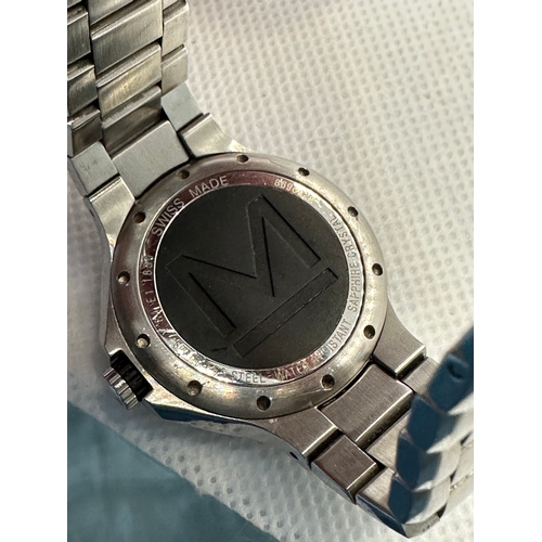 27 - Ladies quality Movado sports watch, fitting up to 16cm circumference wrist. New battery fitted and w... 