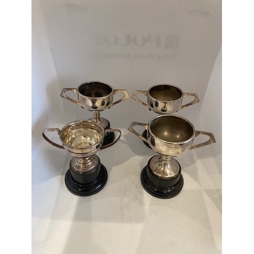 192 - Silver plated trophies (4) no engraving. Largest 8.5cm overall height