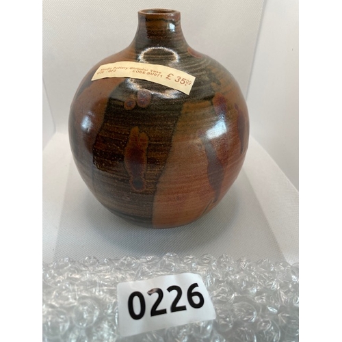 227 - Studio pottery globular vase, brown. CMc on base