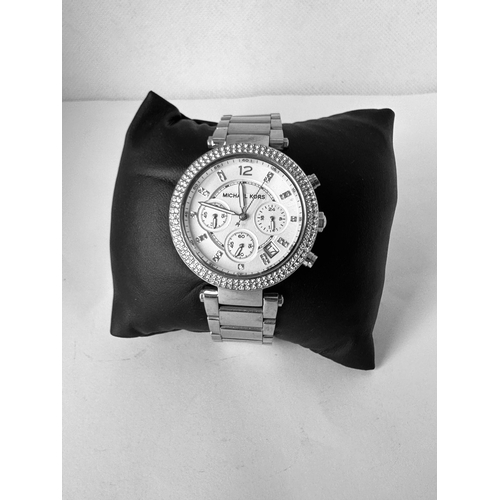 542 - MICHAEL KORS original ladies designer watch, stainless steel and silver face encrusted with faux dia... 