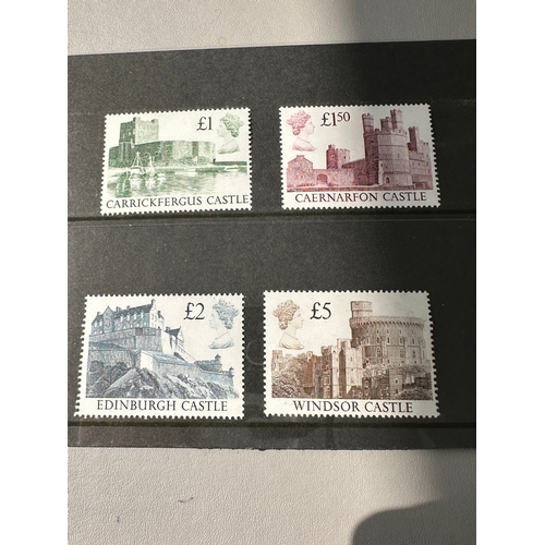 547 - UK GB QEII mint u.m. Castles stamps at face value, still useable Royal Mail stamps, £1 to £5 stamp