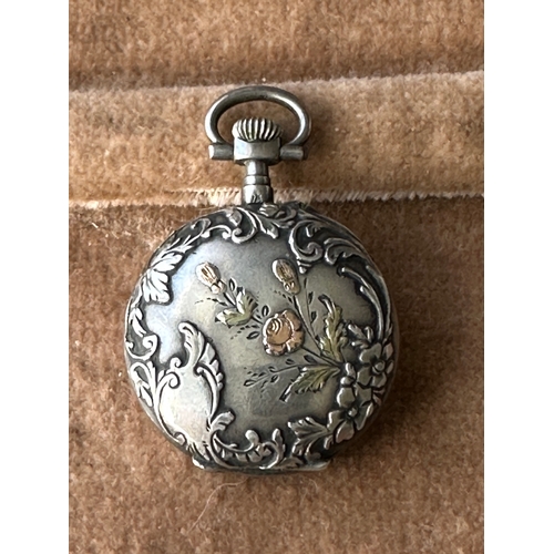 563 - attractive antique ladies silver fob watch with flowers on the rear of case, a/f