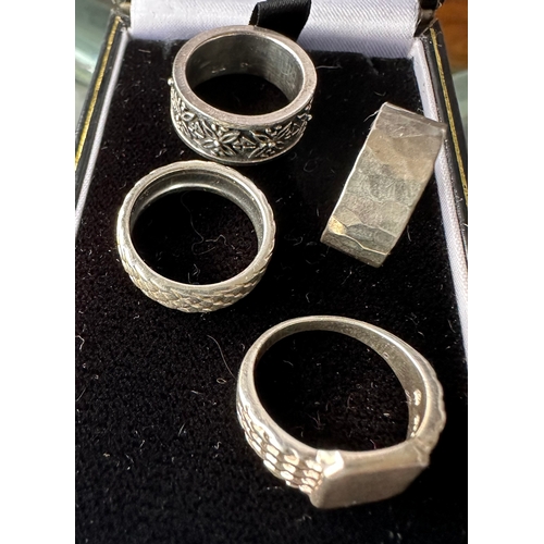 569 - Four sterling silver rings, 3 bands and signet ring, sizes J to L, no box