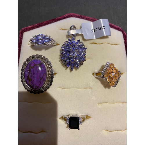 729 - Selection of silver 925 stamped rings and tanzanite ring and pendant, sizes L 1/2 and N 1/2 ( black ... 