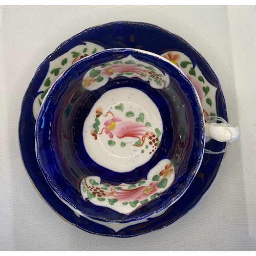 243 - Gaudy Welsh 19th century Tea Cup and Saucer, c 1840 mainly blue and white, saucer approx 14.5cm widt... 