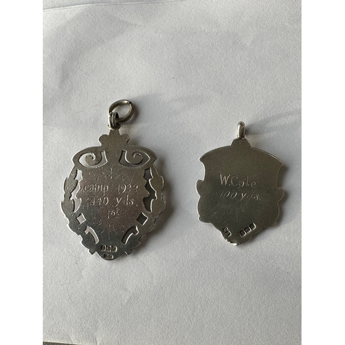 498 - two antique hallmarked Birmingham silver fobs awarded for athletics - running from 1921 and 1922, He... 