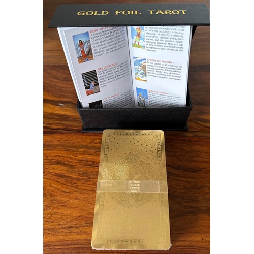 520 - Gold Foil Tarot Cards Set in black and gold storage box complete with guidebook, unused still in cel... 