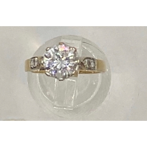 415 - 9ct gold cz solitaire and shoulders, hallmarked, size J, 2.6g