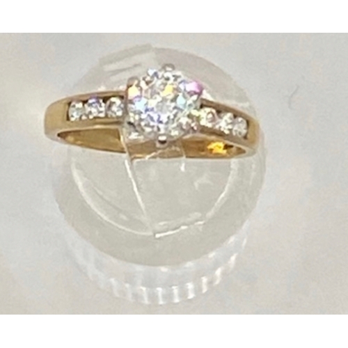 419 - 9ct cz solitaire and shoulders ring, hallmarked, size K 1/2, 2.2g