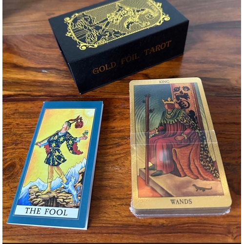 520 - Gold Foil Tarot Cards Set in black and gold storage box complete with guidebook, unused still in cel... 