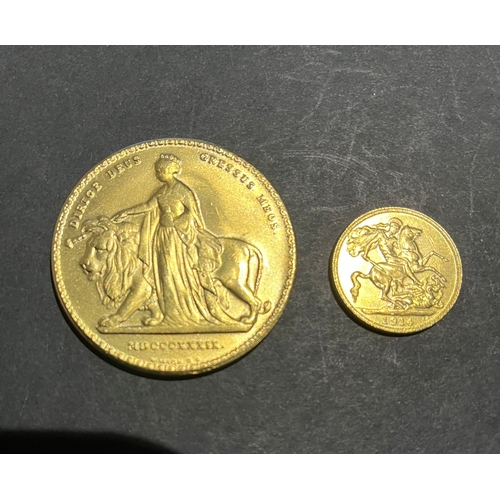 378 - GB QV gold plated Una and the lion coin plus KG gold plated half sovereign coin 1914