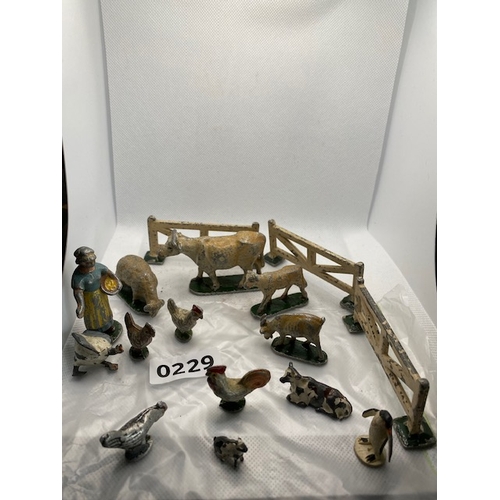 230 - LEAD playworn toys comprising farmers wife, bull, sheep, cow, goat, fowl, rabbit, penguin and fencin... 