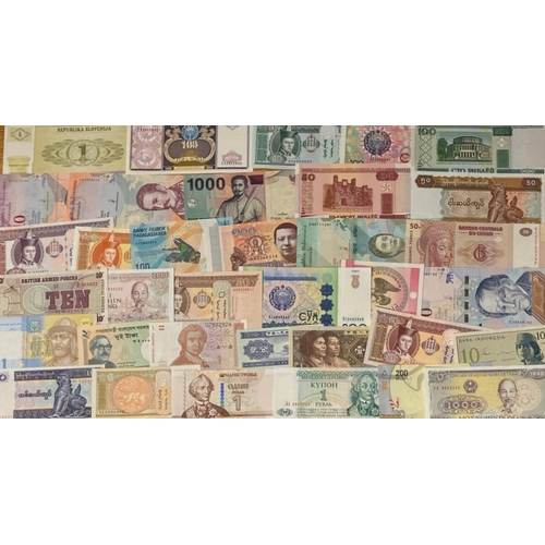 393 - 40 Uncirculated foreign / worldwide bank notes