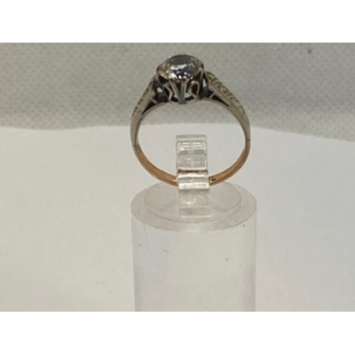 421 - gold and silver cz solitaire and shoulders ring, stamped for gold and silver, size K 1/2, 2g