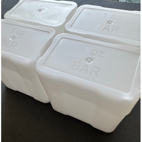 306 - Four empty plastic 'tubes' to hold 20 silver or gold bullion bars each