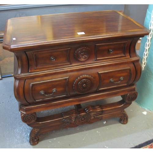 453 - Modern hardwood sideboard having moulded top above two fitted drawers standing on a turned and carve... 