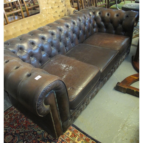 457 - 20th Century leather chesterfield style three seater sofa. 
(B.P. 24% incl. VAT)