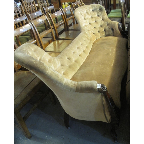 459 - Victorian upholstered button back double ended sofa on a mahogany frame with serpentine front, stand... 