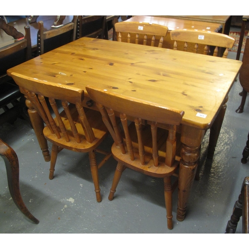 464 - Small modern pine kitchen table, together with a set of four matching pine spindle kitchen chairs. (... 