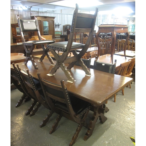 468 - 17th Century style oak refectory type table on X frame supports. Together with a set of eight X fram... 