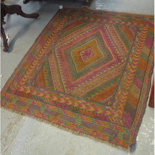 480 - Gazak multi-coloured geometric rug. 135 x 120cm approx. 
(B.P. 24% incl. VAT)