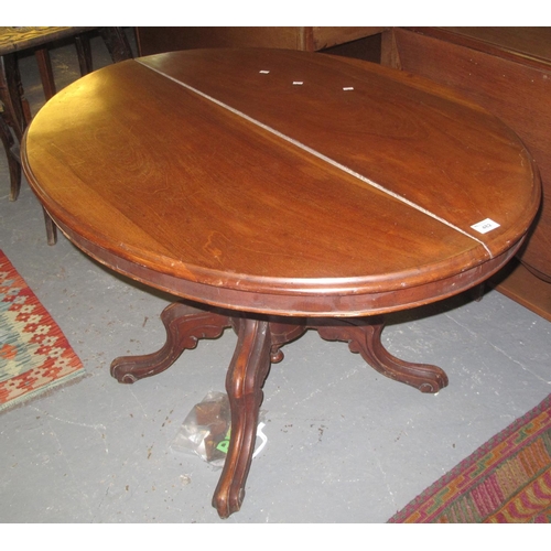 482 - Victorian mahogany tilt top centre table on quatreform base. 
(B.P. 24% incl. VAT)