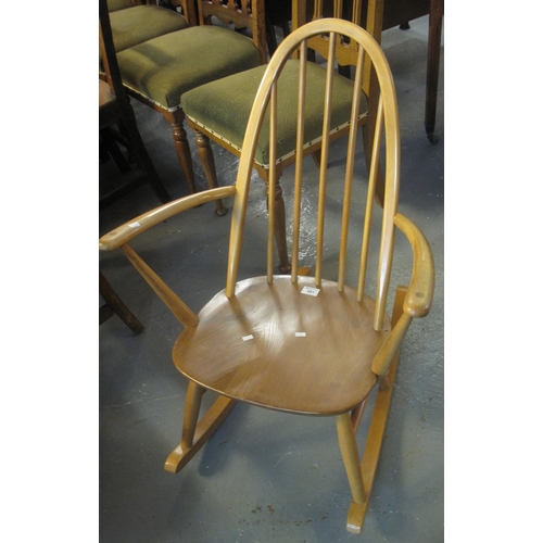 491 - Beech and elm Ercol spindle and hoop back rocking armchair. 
(B.P. 24% incl. VAT)