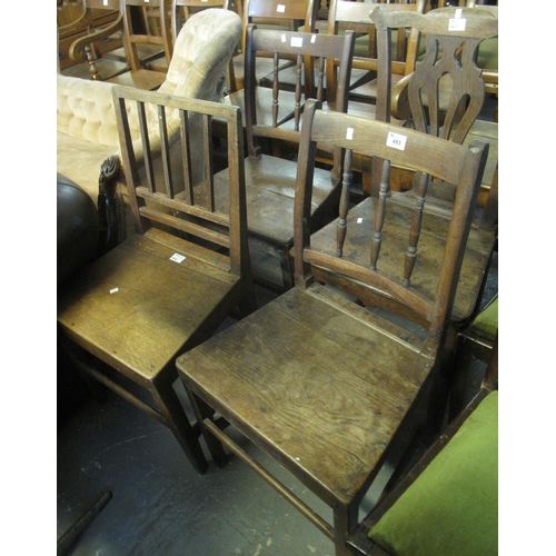 493 - Collection of four 19th Century oak farmhouse kitchen chairs to include a pair of spindle chairs, st... 