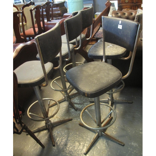 497 - Set of five mid Century leather finish and chrome tubular bar stools. (5)
(B.P. 24% incl. VAT)