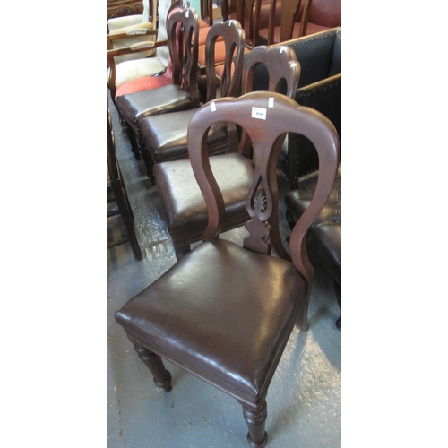 499 - A set of four Victorian mahogany dining chairs with leather finish seats on turned supports. (4)
(B.... 