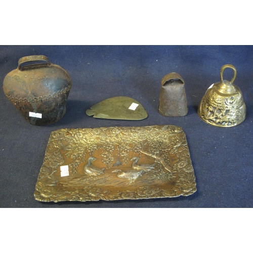 63 - A rectangular cast metal tray decorated with foliage and ducks, possibly oriental, two cow bells, a ... 