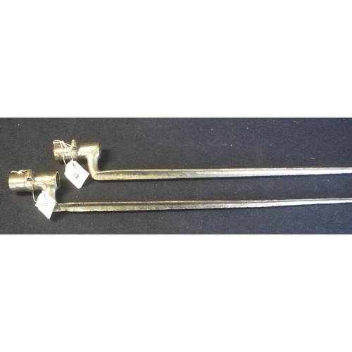 69 - Two similar socket bayonets with flat triangular fullered blades. (2)
(B.P. 24% incl. VAT)