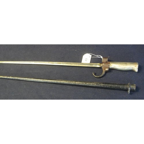 72 - 19th Century cruciform bayonet with tapering metal scabbard. 
(B.P. 24% incl. VAT)