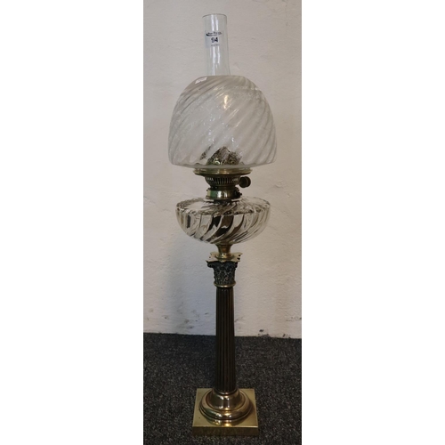 94 - Late Victorian brass double burner oil lamp with moulded glass reservoir on brass corinthian column ... 