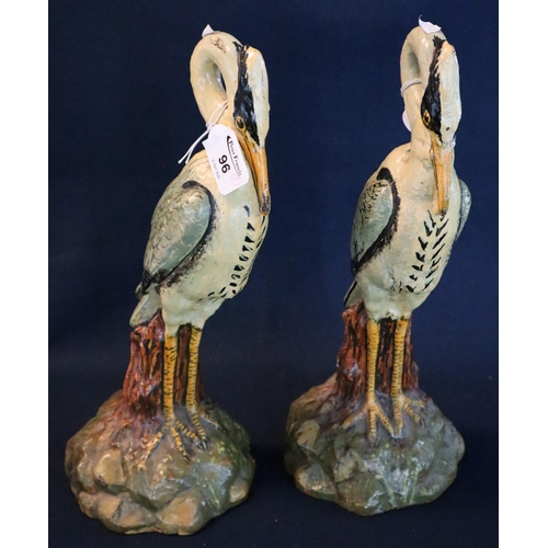 96 - A pair of unusual polychrome painted case iron door stops in the form of herons. Probably 19th Centu... 