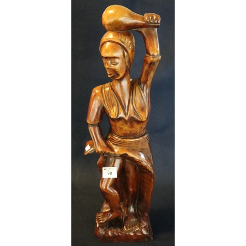 98 - Modern carved tribal wooden study of a lady with club on her head. 
(B.P. 24% incl. VAT)