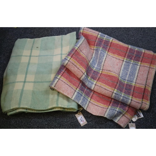 115 - Two vintage woollen check blankets, one green and cream and the other multi-coloured with a Gwili Mi... 