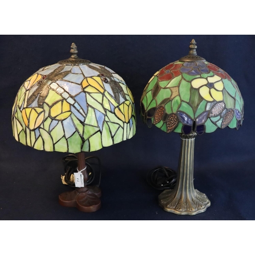 77 - Two similar modern Tiffany style table lamps with mushroom shaped lidded shades, decorated with flow... 