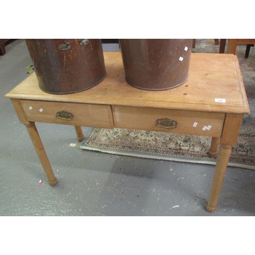 498 - Early 20th Century pine two drawer side table on cylinder legs. 
(B.P. 21% + VAT)