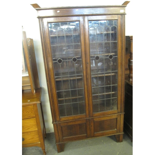 504 - Early 20th Century oak lead and stain glass panelled two door display cabinet or bookcase, appears t... 