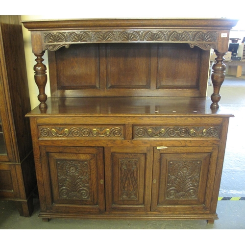 509 - 17th Century style good quality oak carved court cupboard.
(B.P. 21% + VAT)