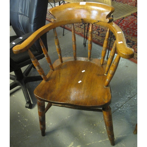 521 - Early 20th Century elm smokers bow chair.
(B.P. 21% + VAT)